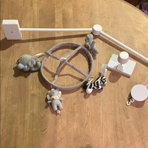 Pottery barn mobile and crib arm